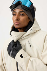 Chaqueta de nieve totalmente impermeable con múltiples bolsillos y ventilación en color blanco roto para mujer